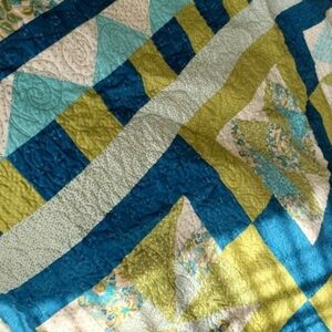 Patchwork Quilt in Spring Meadow Designed by Carla Ribidas and Donna Watts